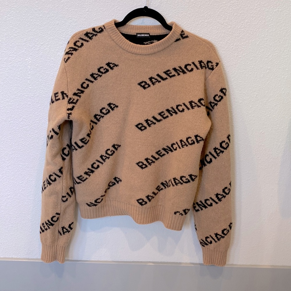 Balenciaga all over logo wool sweater.